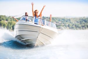 people driving a boat